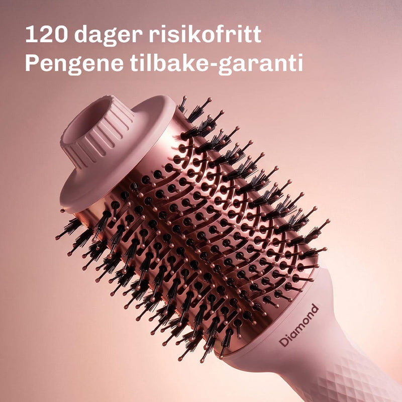 Anti-frizz varmluftsbørste som reduserer statisk hår og etterlater håret glatt og glansfullt.
